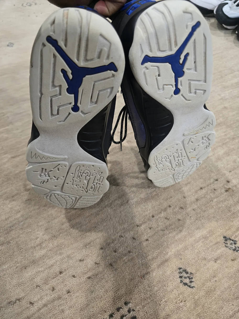 Air Jordan Black Suede High-Top Sneakers with Blue Accent